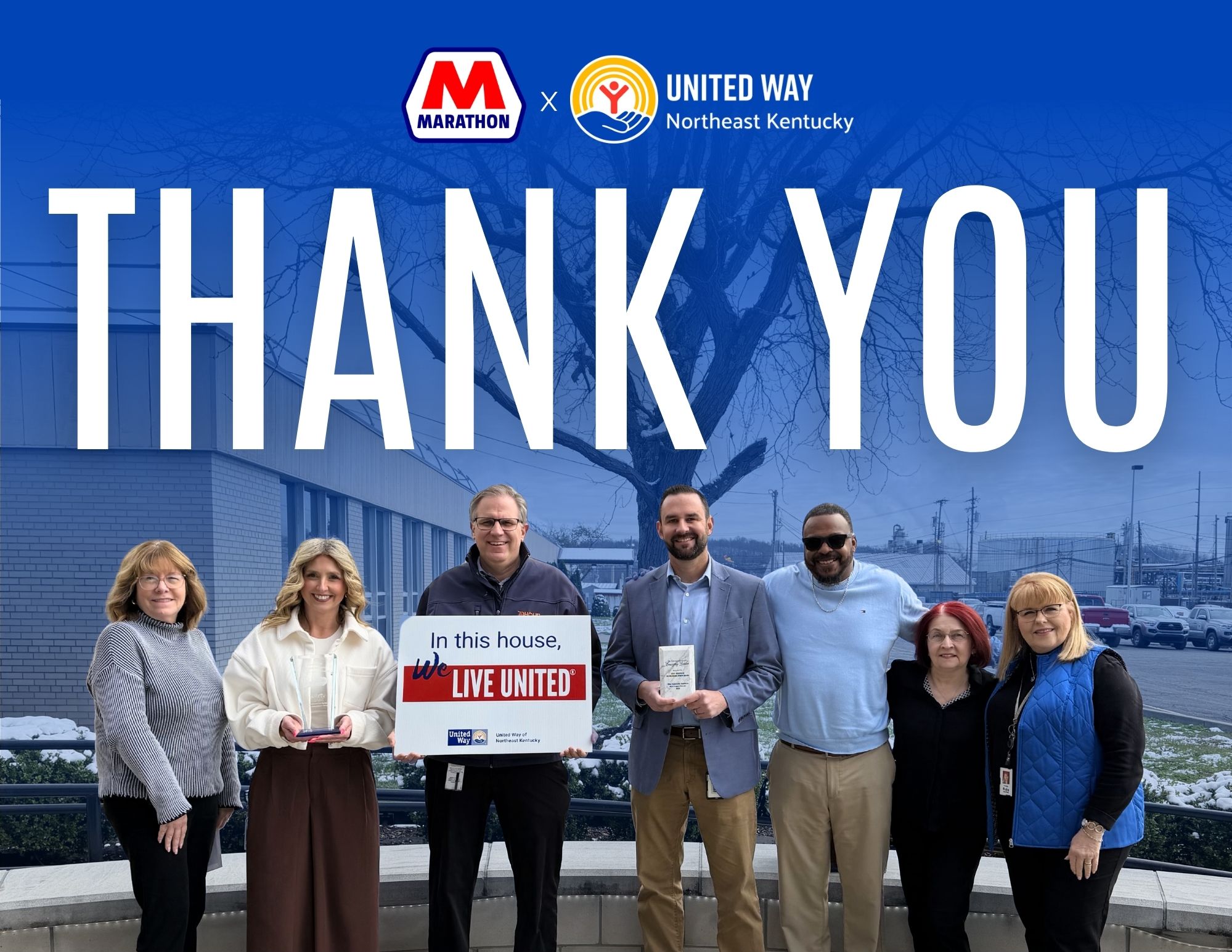 photo of united way with marathon presenting a check